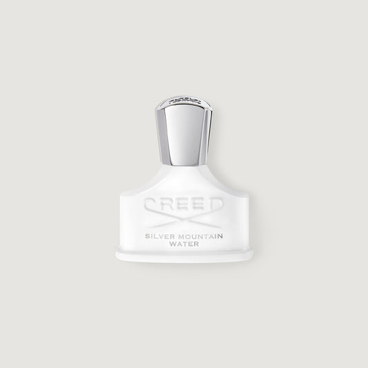 100ml white bottle and silver cap labelled Silver Mountain Water with the creed logo